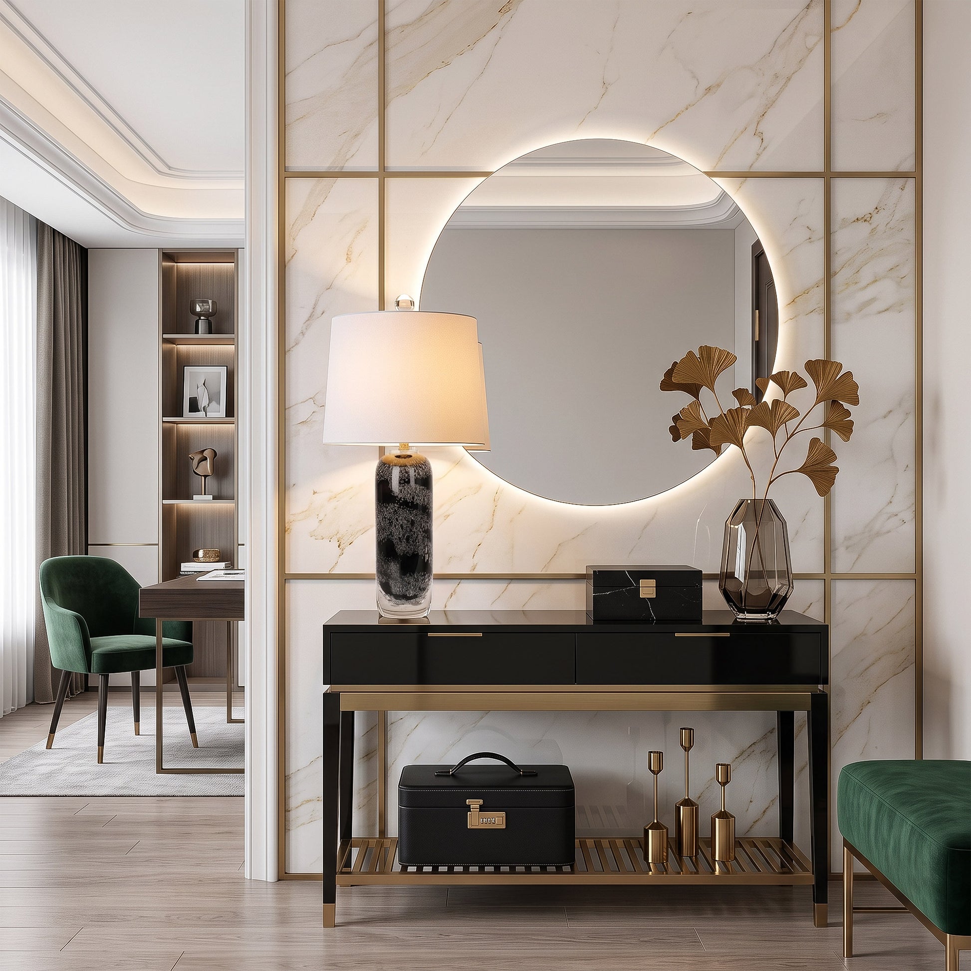 Modern art glass table lamp shining brightly on a black console table in an elegant entryway foyer with round backlit mirror.