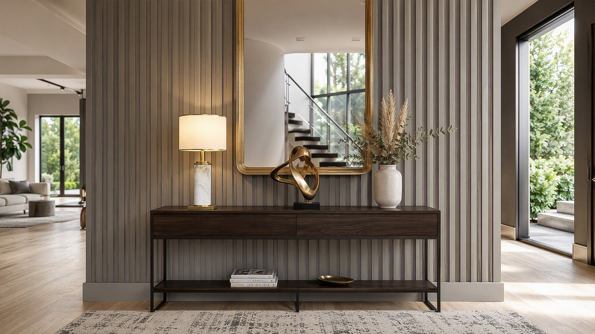 Illuminated white marble table lamp on dark wood console table in modern elegant hallway entry