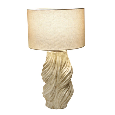 Warm illuminated handmade vintage twisted ceramic table lamp with beige fabric shade on white background