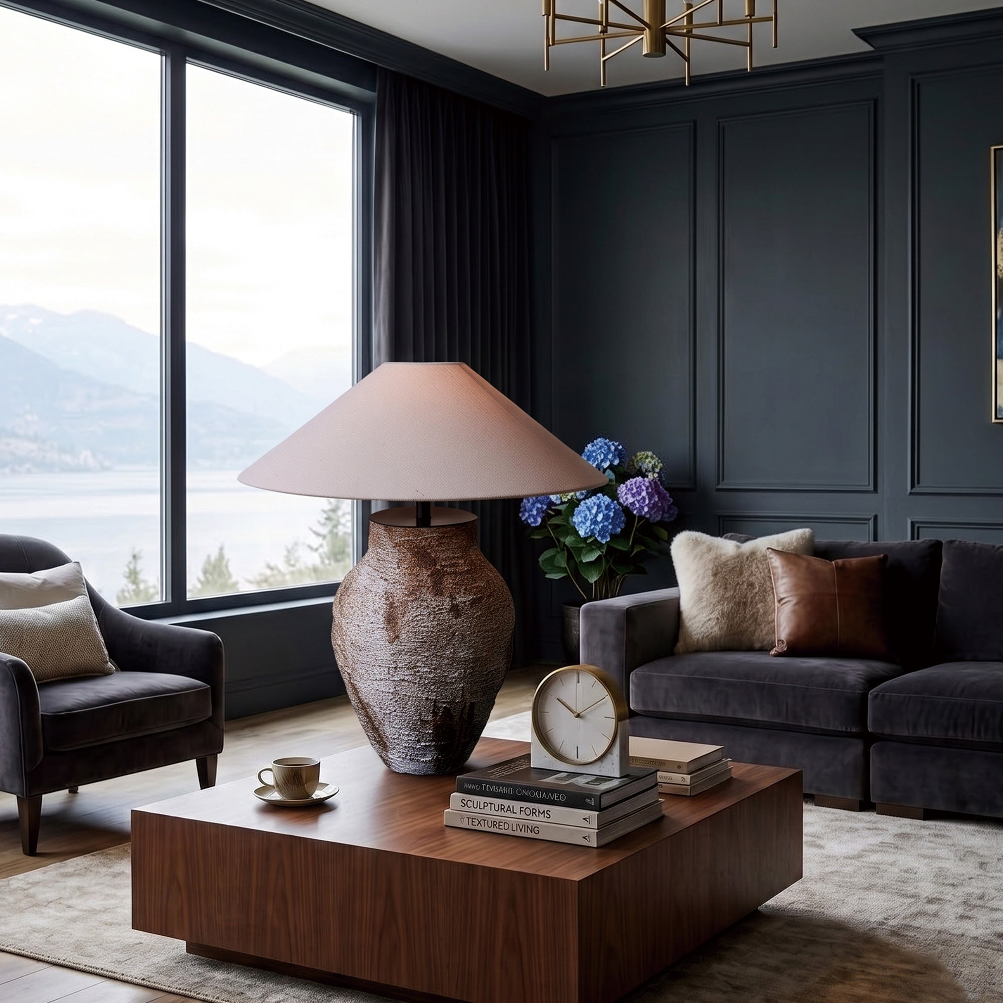 Illuminated rustic ceramic table lamp creating warm ambience on a wooden coffee table in a modern dark living room.