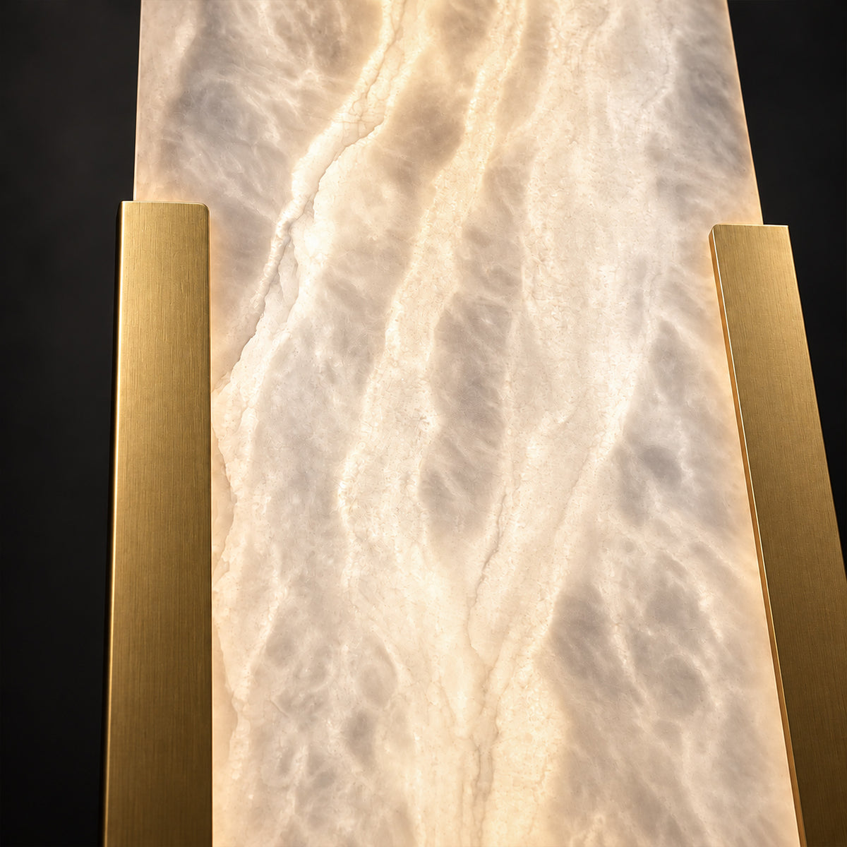 Close up detail of illuminated Spanish natural alabaster stone texture showing delicate cloud and river patterns