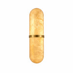 A luxurious pill-shaped Spanish alabaster wall sconce with a built-in LED light source and a central polished brass band, illuminated on a white background.