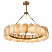 A premium luxury single tier round chandelier made of hand chipped Spanish alabaster stone slices on a solid brass ring framework, isolated on a clean white background.