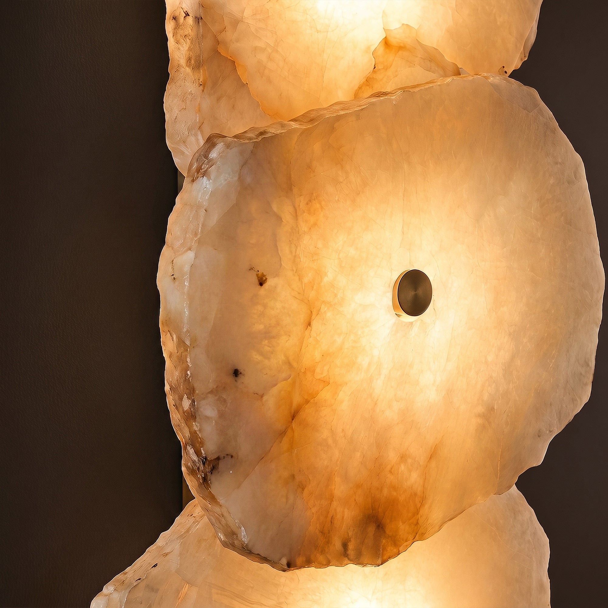 Close-up shot of the unique organic cloud-like veining inside natural Spanish alabaster stone when illuminated from within.