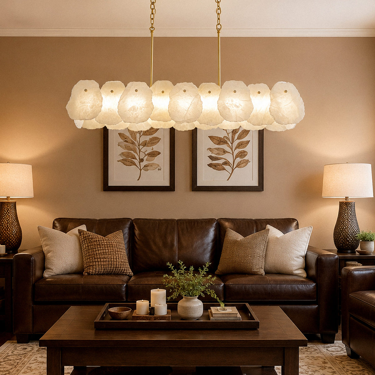Spanish alabaster linear chandelier illuminating warm beige living room with brown leather sofa