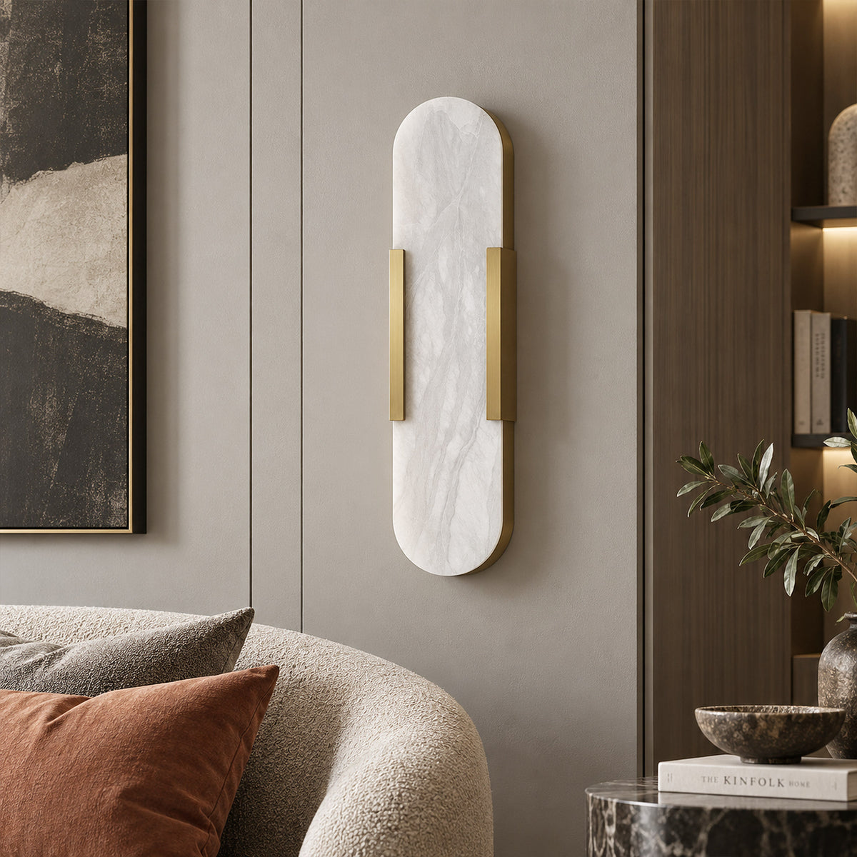 Unlit capsule Spanish natural alabaster wall sconce with natural stone grain mounted on wall near sofa